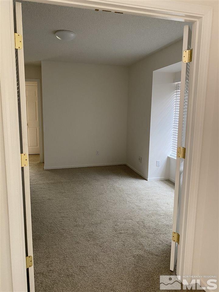 5236 Simons Drive Reno, NV 89523 - Photo 15 of 19 a view of room and hallway