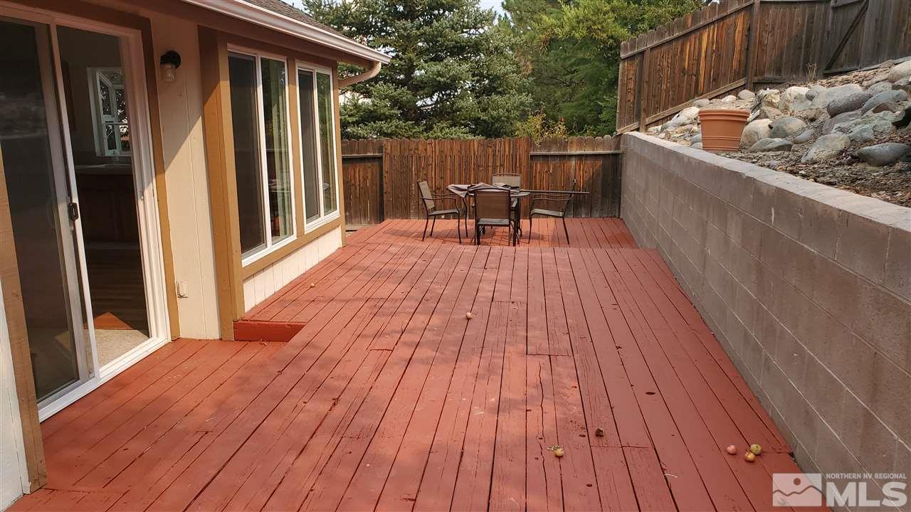 5236 Simons Drive Reno, NV 89523 - Photo 19 of 19 a balcony with furniture and wooden floor