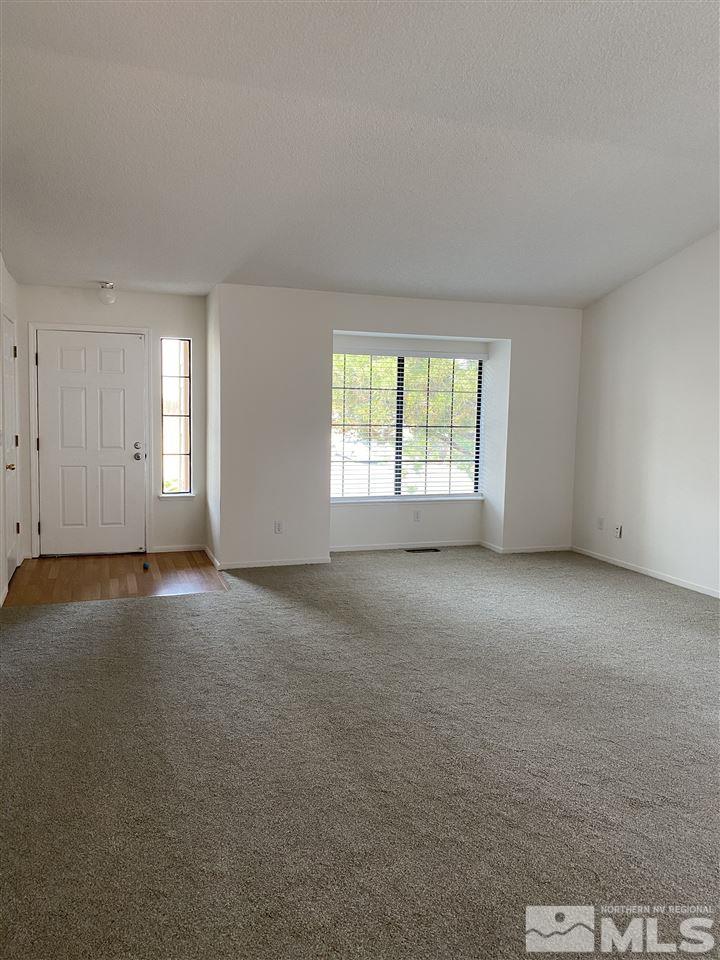 5236 Simons Drive Reno, NV 89523 - Photo 6 of 19 an empty room with a window