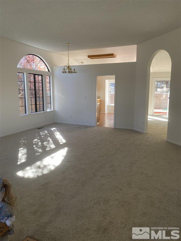 5236 Simons Drive Reno, NV 89523 - Photo 7 of 19 a view of a livingroom with window