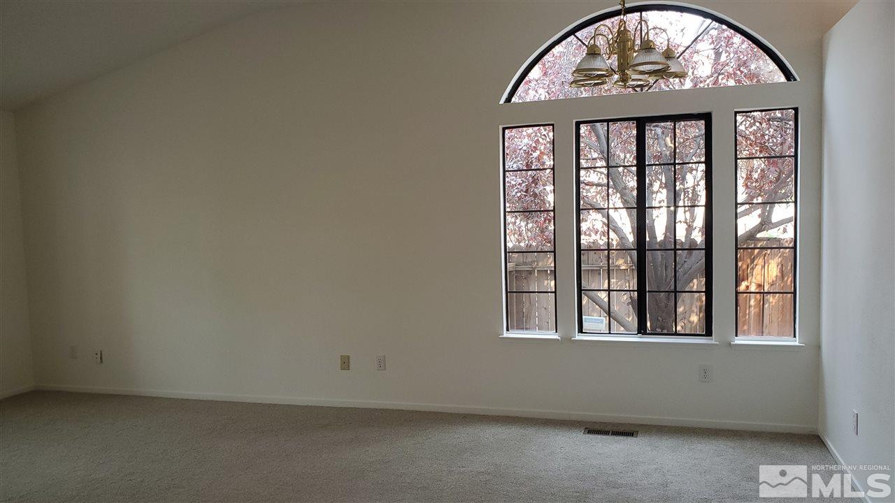 5236 Simons Drive Reno, NV 89523 - Photo 8 of 19 an empty room with a window