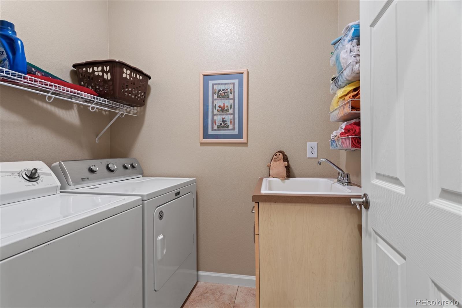 4207 Frederick Circle Longmont, CO 80503 - Photo 14 of 35 a utility room with dryer and washer