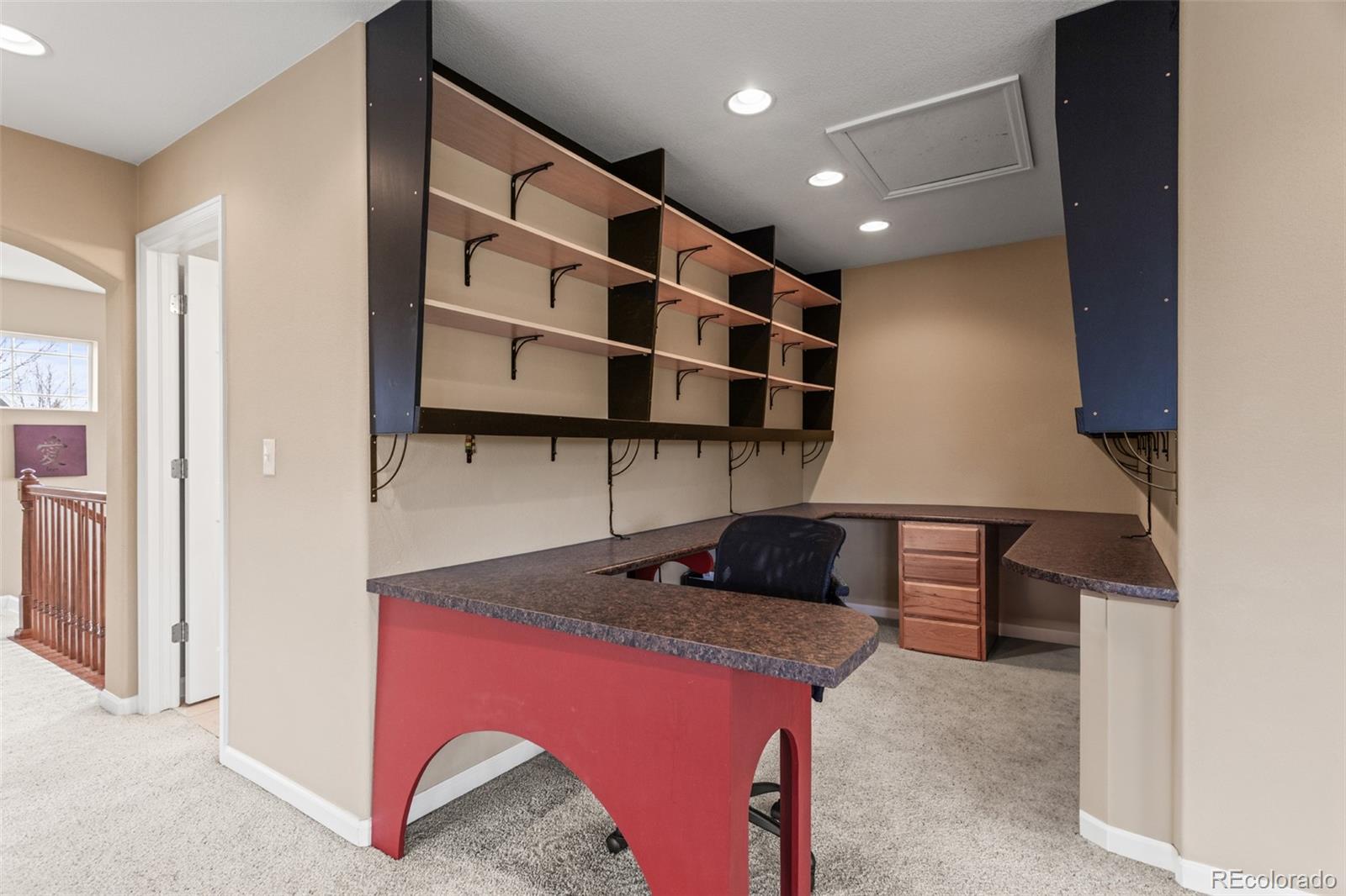 4207 Frederick Circle Longmont, CO 80503 - Photo 24 of 35 a kitchen with stainless steel appliances granite countertop a sink and a microwave