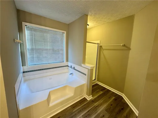 a view of a room with dryer and on the wall