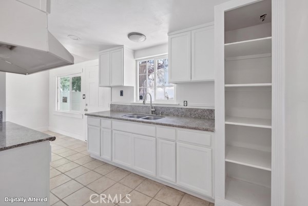 13391 Mesquite Road Whitewater, CA 92282 - Photo 22 of 27 a bathroom with a sink and a mirror