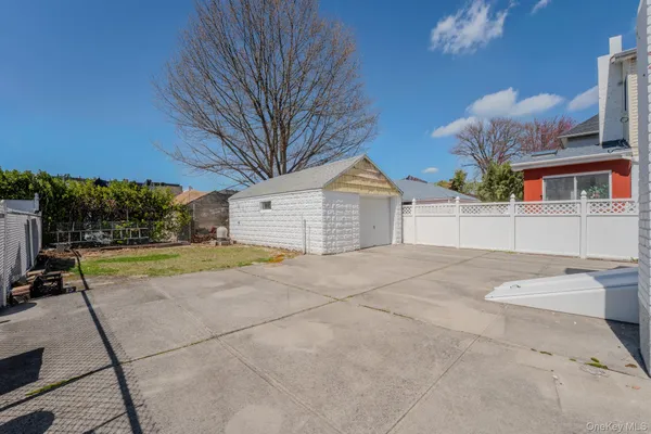 a front view of a house with garage