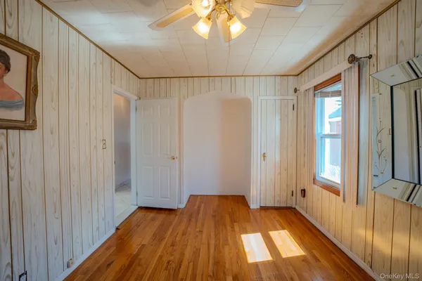 a view of entryway with wooden floor