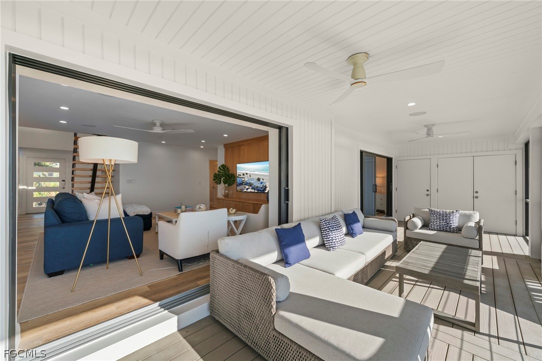 19 Beach Homes Captiva, FL 33924 - Photo 21 of 49 a living room with furniture and a table