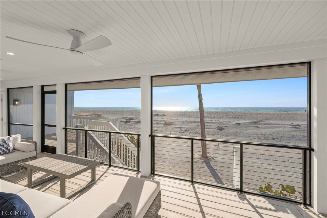19 Beach Homes Captiva, FL 33924 - Photo 22 of 49 a view of a living room and floor to ceiling window or wooden floor
