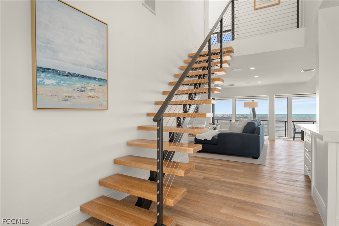 19 Beach Homes Captiva, FL 33924 - Photo 7 of 49 a view of entryway and hall with wooden floor