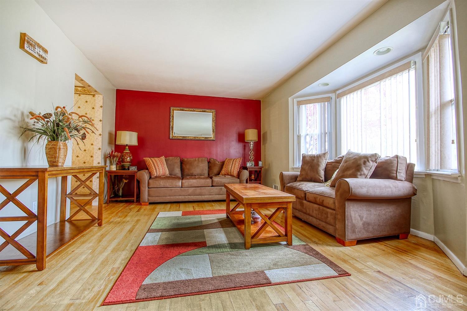 19 Sulliman Road Edison, NJ 08817 - Photo 10 of 22 a living room with furniture rug and window