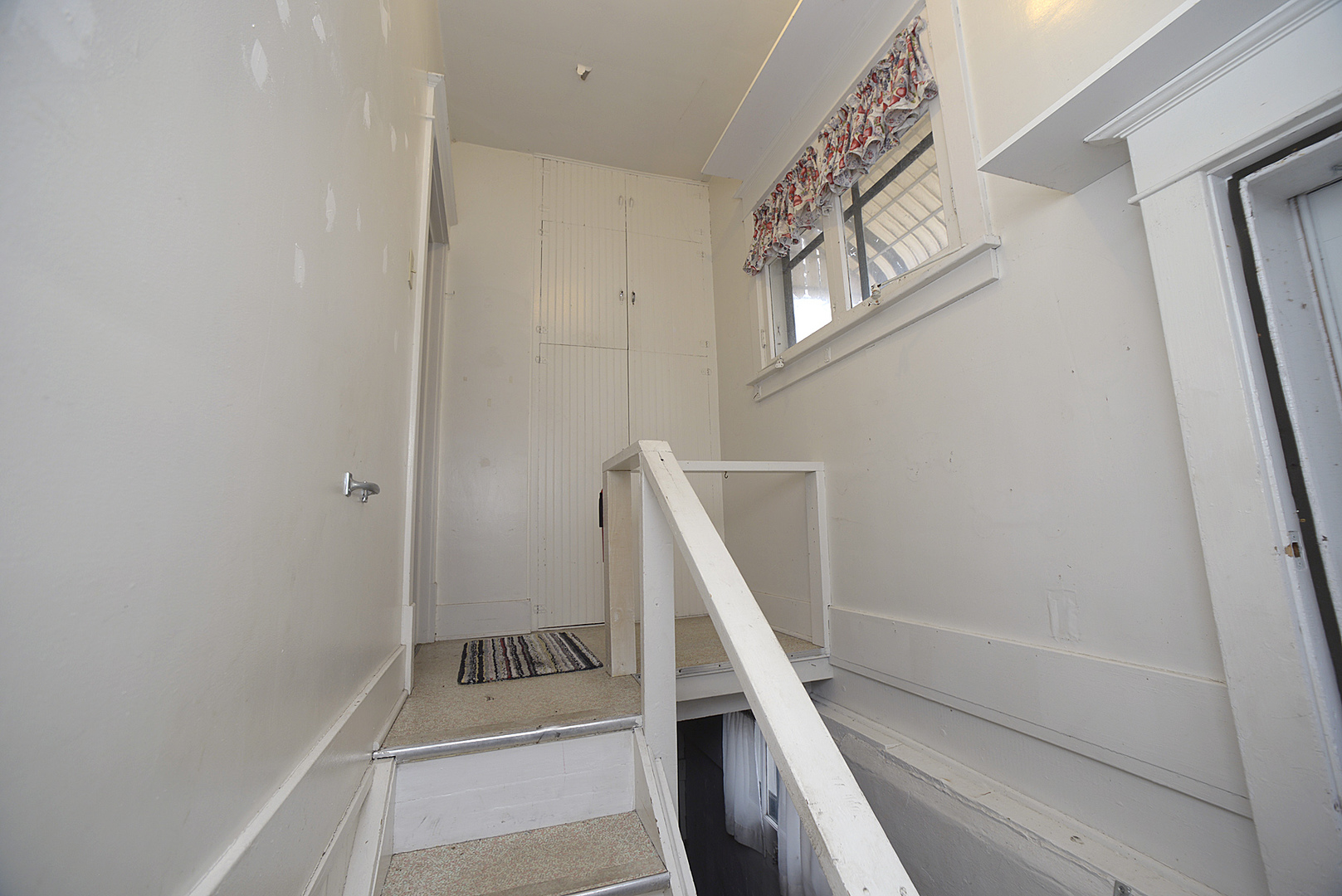 221 East Grove Street Utica, IL 61373 - Photo 15 of 27 a view of an entryway with staircase