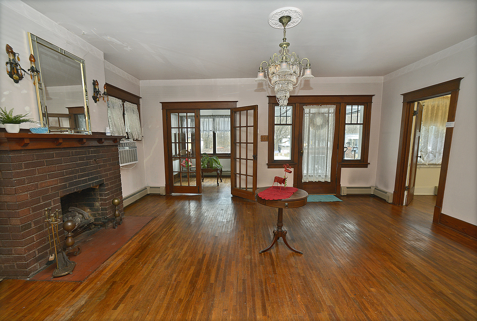 221 East Grove Street Utica, IL 61373 - Photo 2 of 27 a living room with furniture and a fireplace