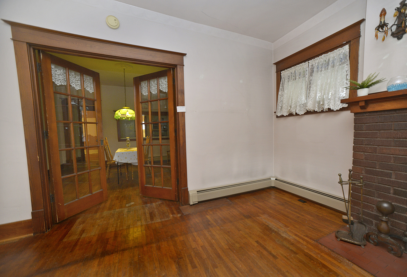 221 East Grove Street Utica, IL 61373 - Photo 3 of 27 wooden floor in an empty room