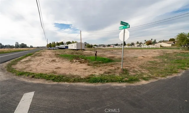 a living room with lots of furniture and a wooden floor