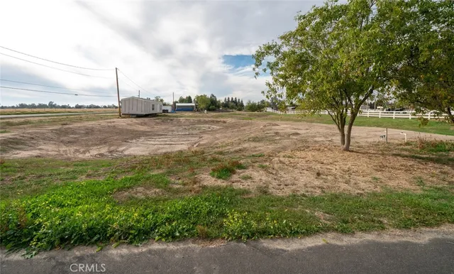 a living room with furniture a flat screen tv and a window