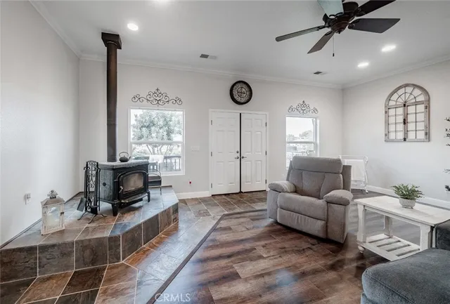 a kitchen with a sink appliances and cabinets