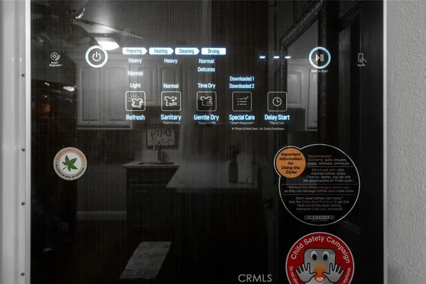 a view of a chairs and table in backyard