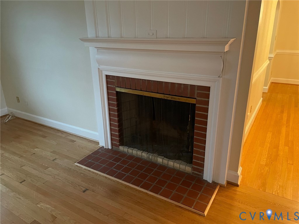 1310 Forest Avenue Henrico, VA 23229 - Photo 3 of 6 a living room with a fireplace