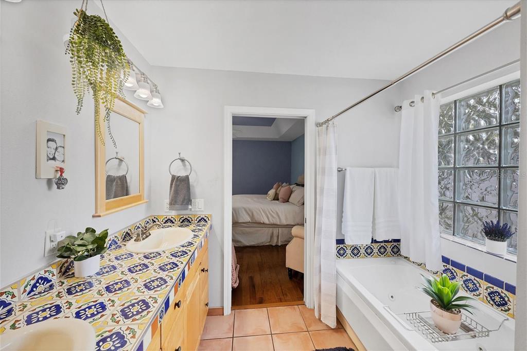 7192 North Paragon Road North Port, FL 34291 - Photo 19 of 40 a bedroom with a bed and a window