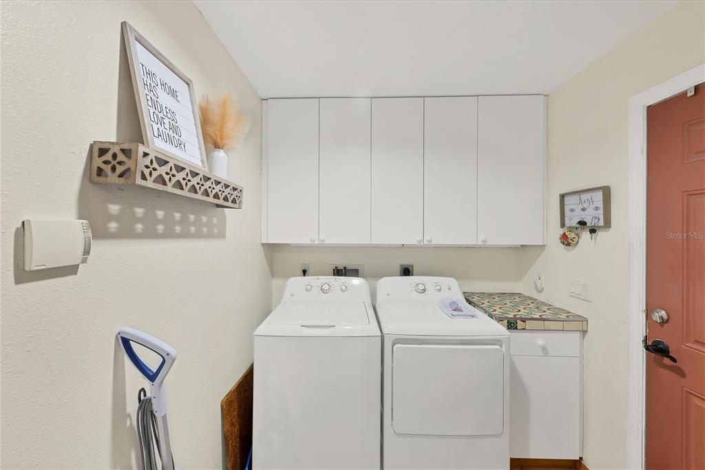 7192 North Paragon Road North Port, FL 34291 - Photo 26 of 40 a utility room with dryer and washer