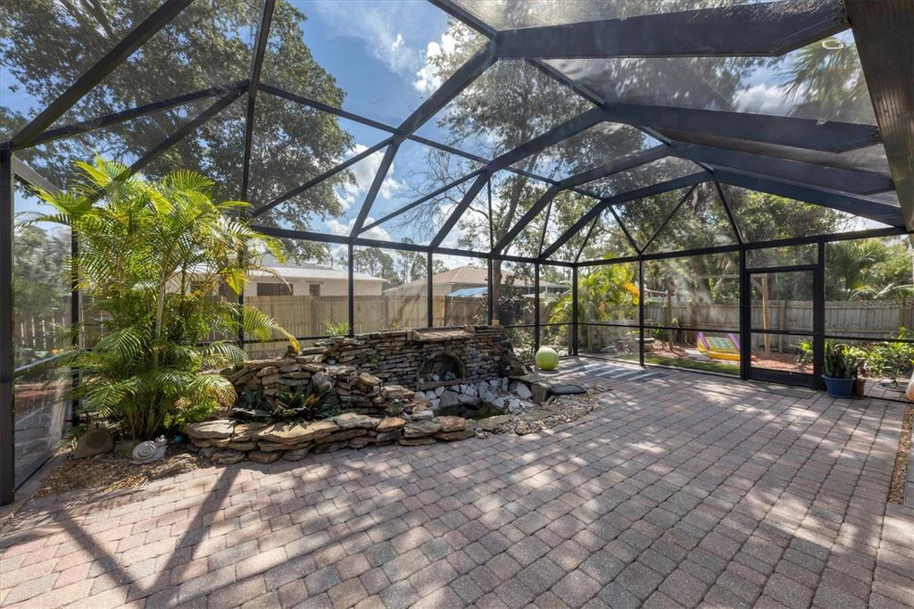 7192 North Paragon Road North Port, FL 34291 - Photo 28 of 40 a view of backyard with table and chairs under an umbrella