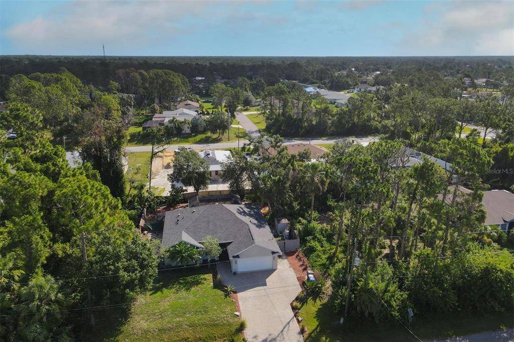 7192 North Paragon Road North Port, FL 34291 - Photo 38 of 40 an aerial view of residential houses with outdoor space and trees