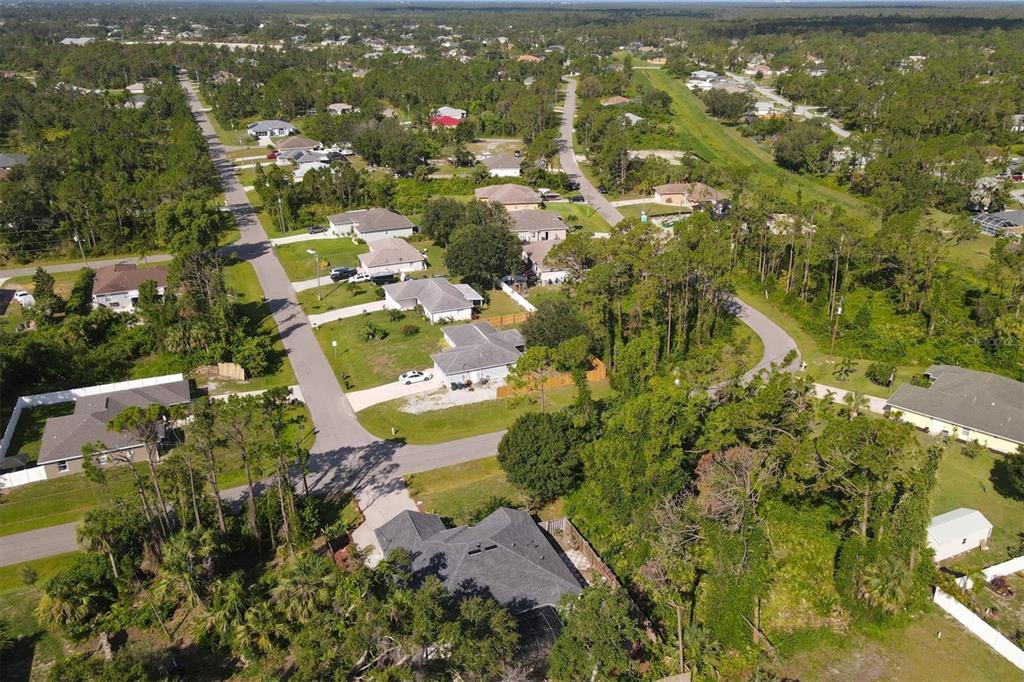 7192 North Paragon Road North Port, FL 34291 - Photo 39 of 40 an aerial view of residential houses with outdoor space and trees