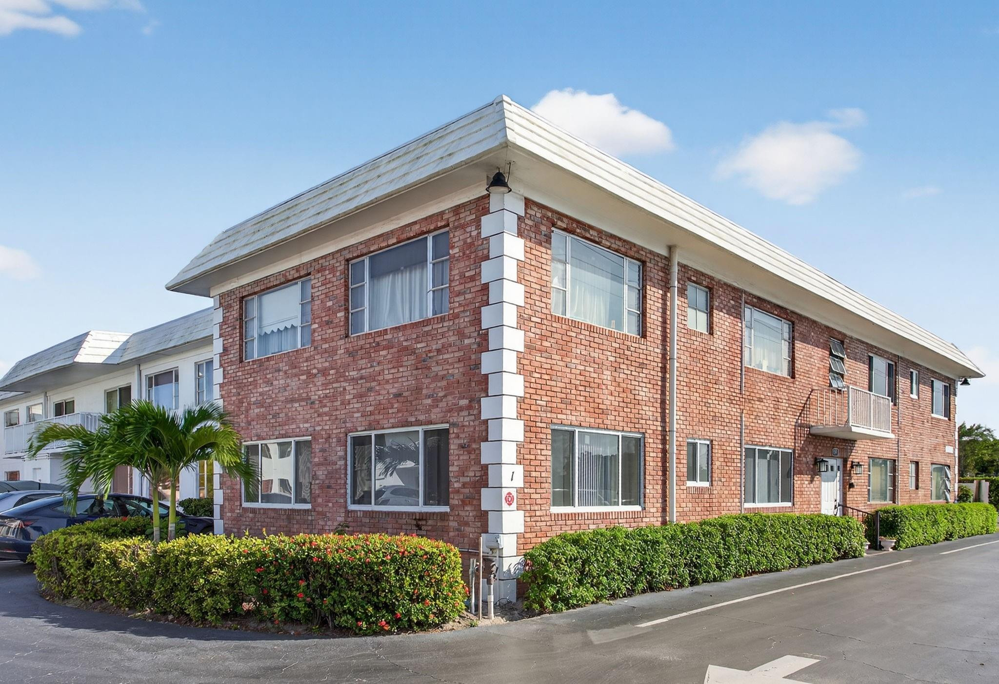 418 South Cypress Road, Unit 110 Pompano Beach, FL 33060 - Photo 5 of 28 a front view of a building