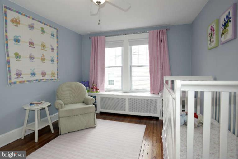 631 Anneslie Road Baltimore, MD 21212 - Photo 22 of 30 Bedroom two with built-in bookcases.
