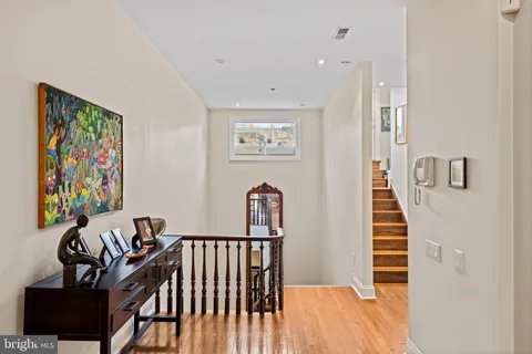 a view of a hallway with workspace