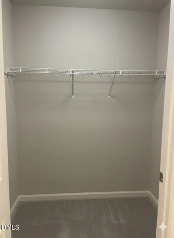 a view of small space with racks on the wall