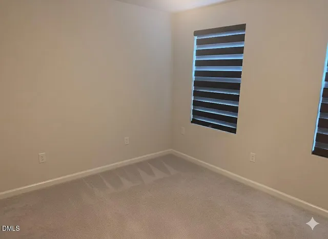 a view of a room with a window