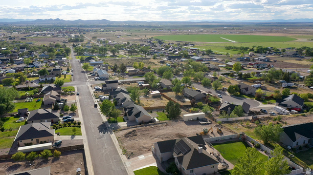 1797 Sunset Road Enoch, UT 84721 - Photo 67 of 80 Aerial perspective showcasing a residential area with varied housing styles
