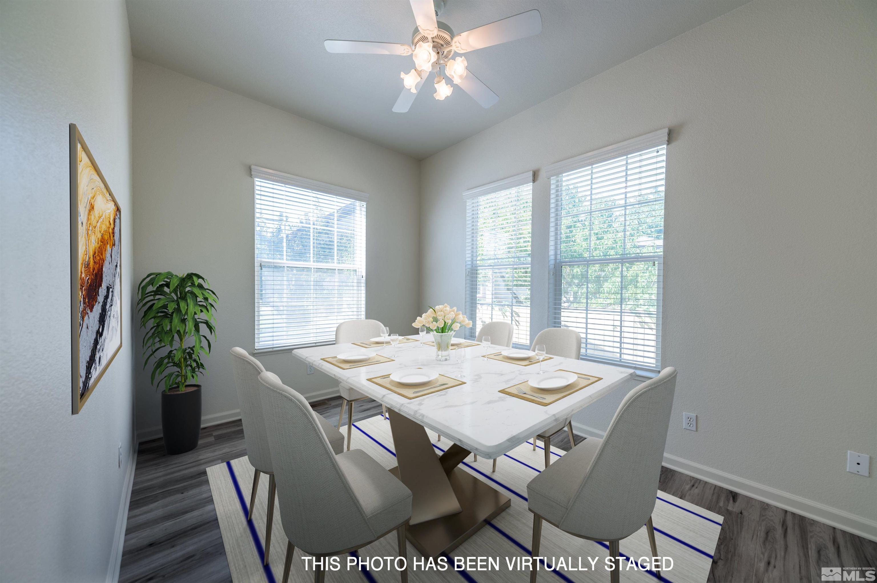 1462 Wessex Circle Reno, NV 89503 - Photo 13 of 40 a view of a dining room with furniture window and outside view