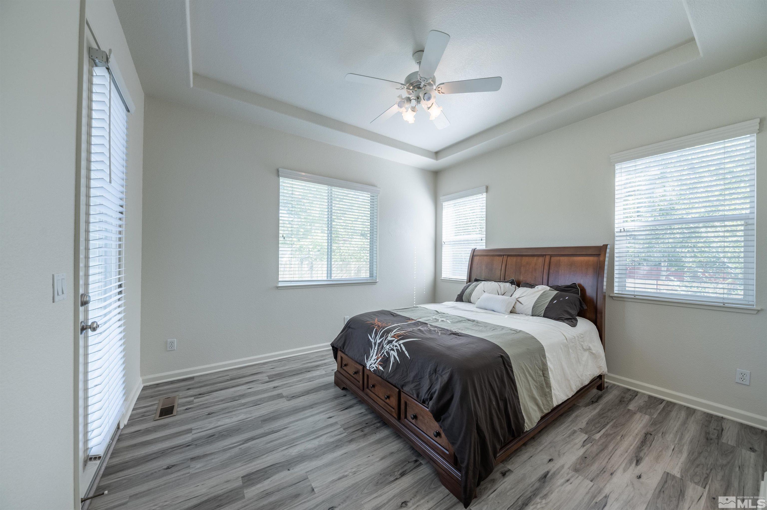 1462 Wessex Circle Reno, NV 89503 - Photo 15 of 40 a bedroom with a bed and window