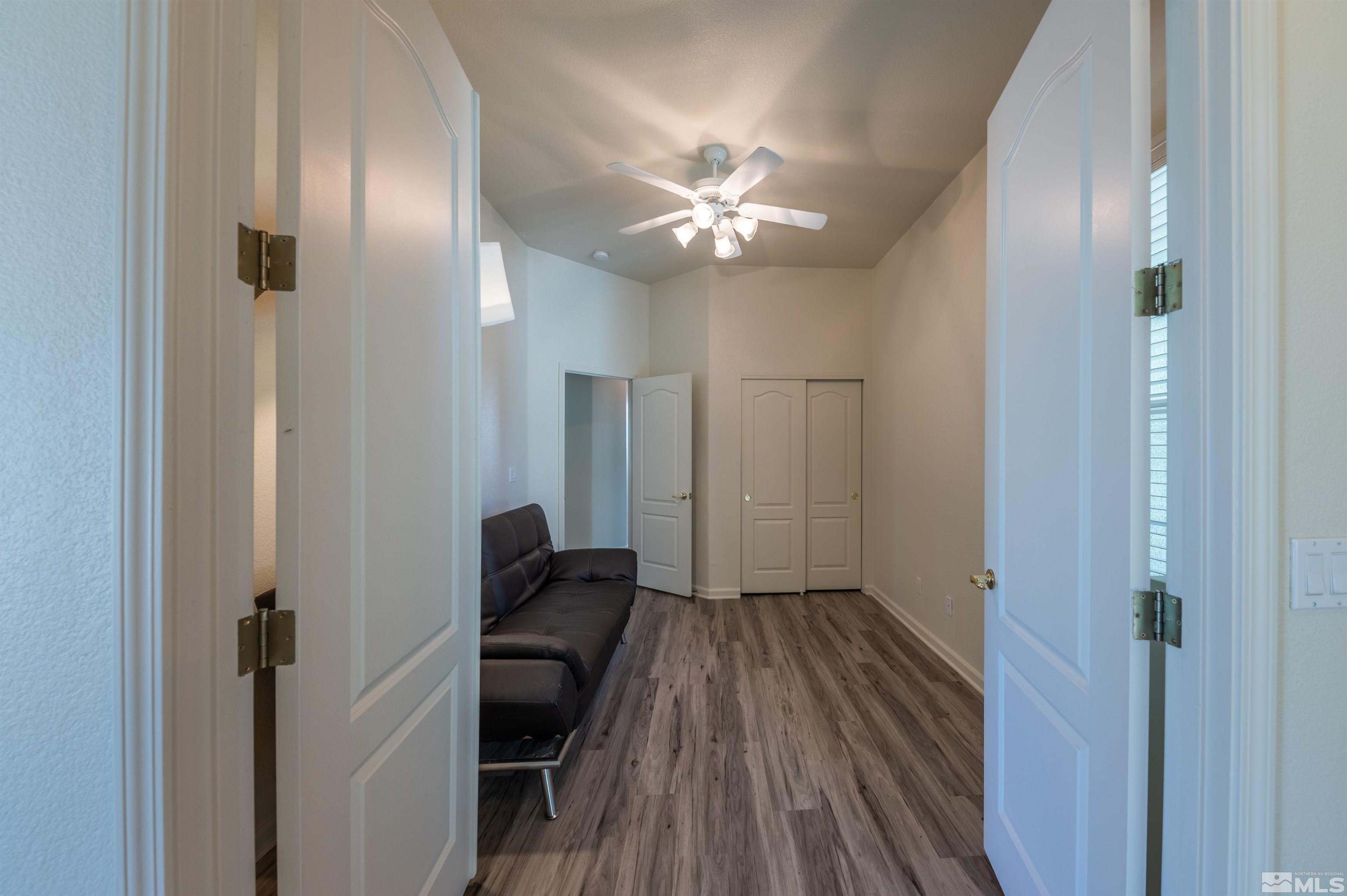 1462 Wessex Circle Reno, NV 89503 - Photo 20 of 40 a view of a hallway with wooden floor