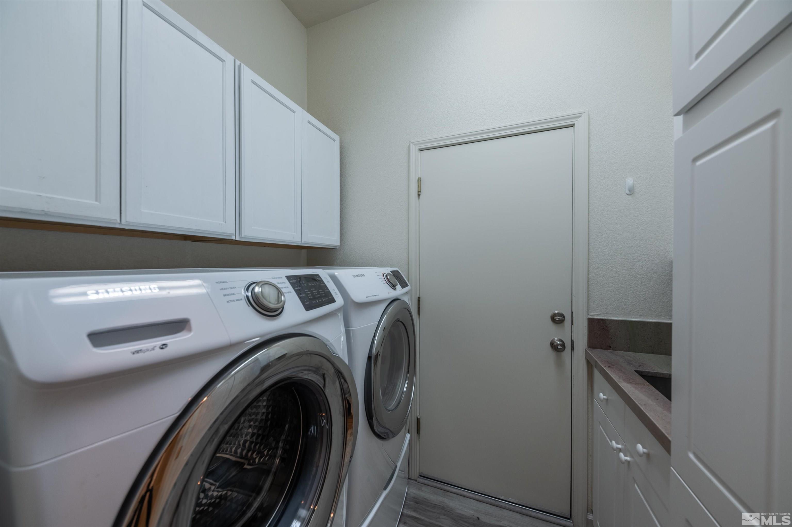 1462 Wessex Circle Reno, NV 89503 - Photo 21 of 40 a utility room with dryer and washer