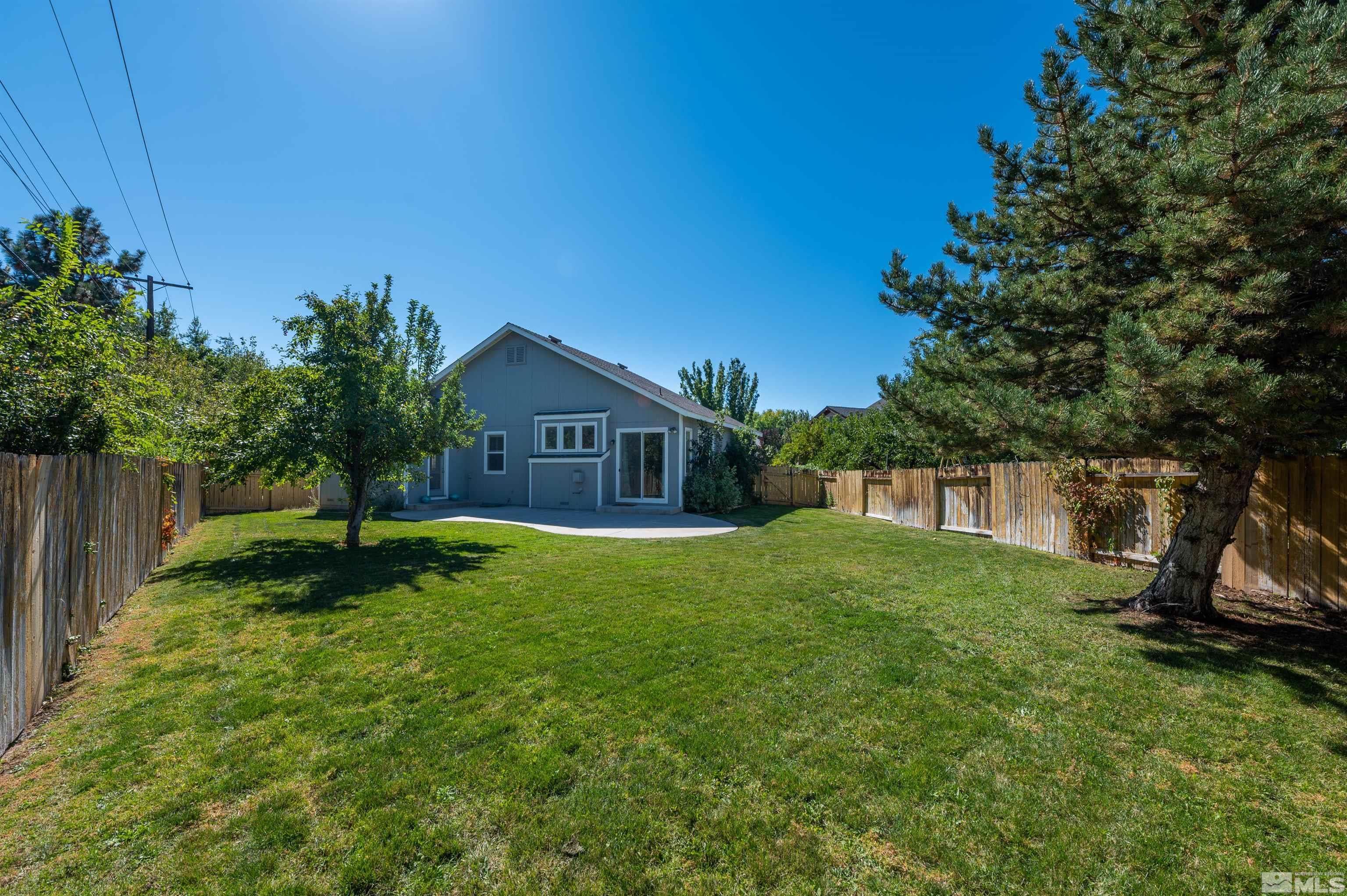 1462 Wessex Circle Reno, NV 89503 - Photo 26 of 40 a house view with a garden space