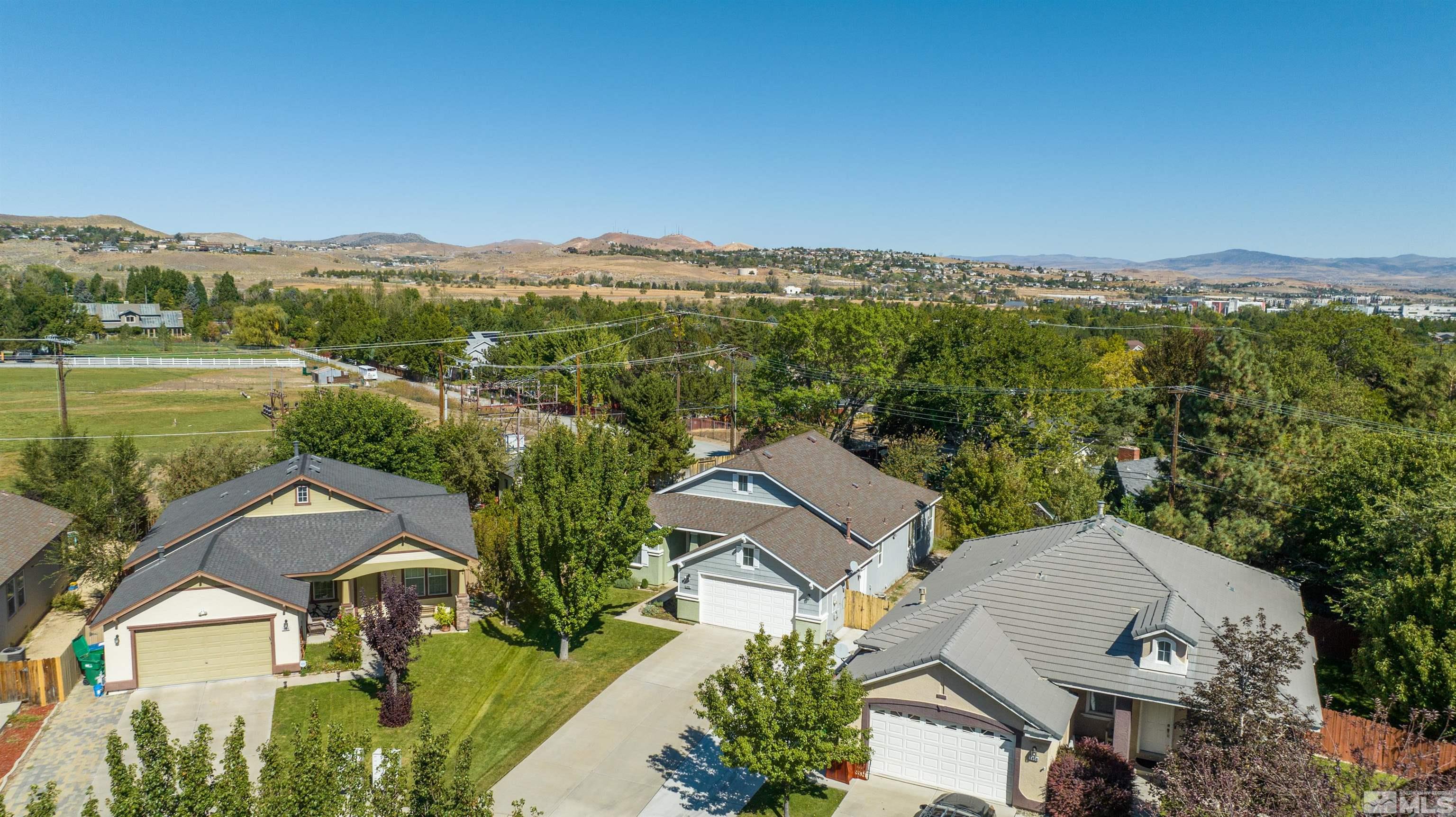 1462 Wessex Circle Reno, NV 89503 - Photo 29 of 40 an aerial view of residential houses with outdoor space and ocean view