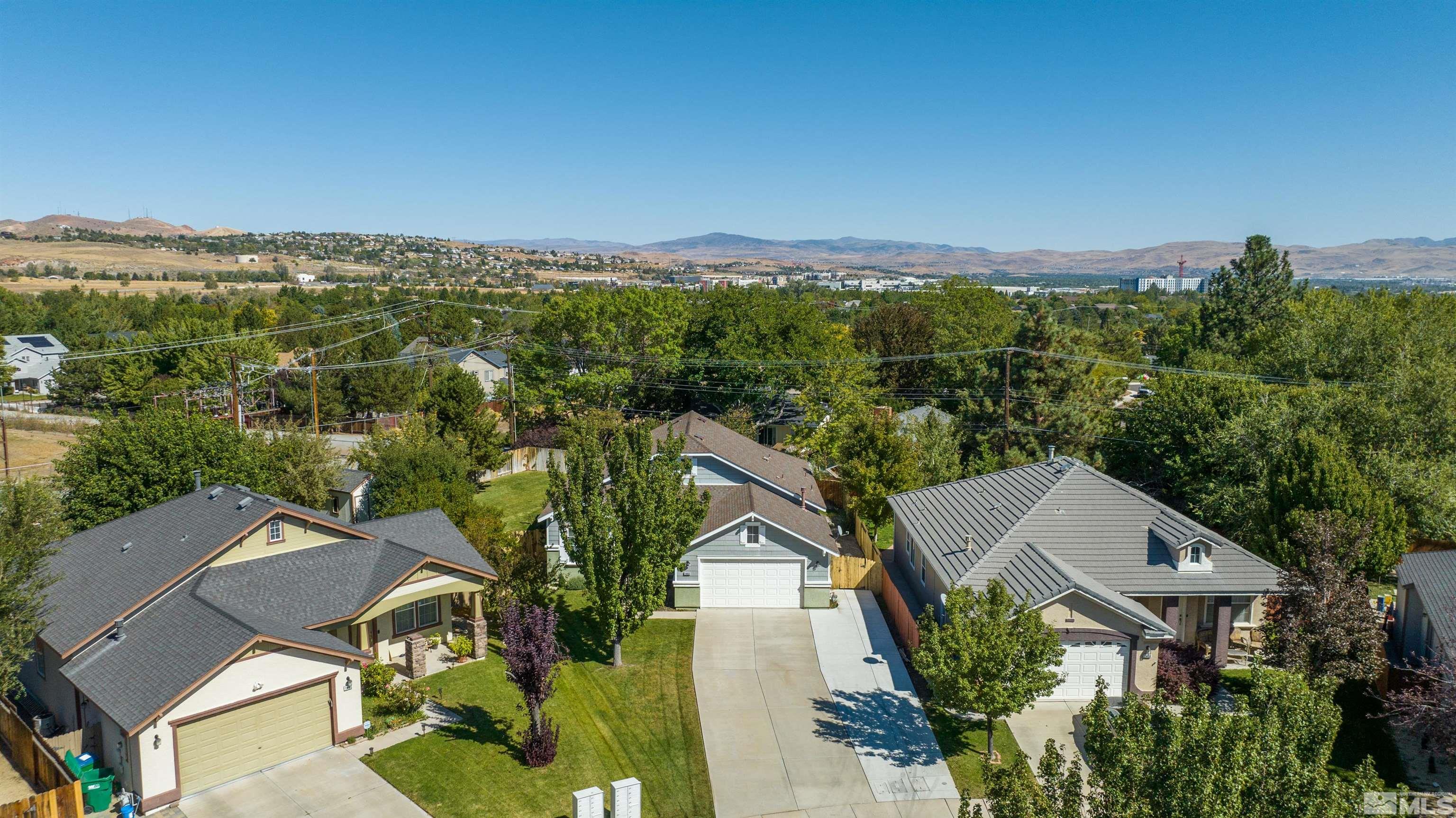 1462 Wessex Circle Reno, NV 89503 - Photo 30 of 40 an aerial view of a house with a yard