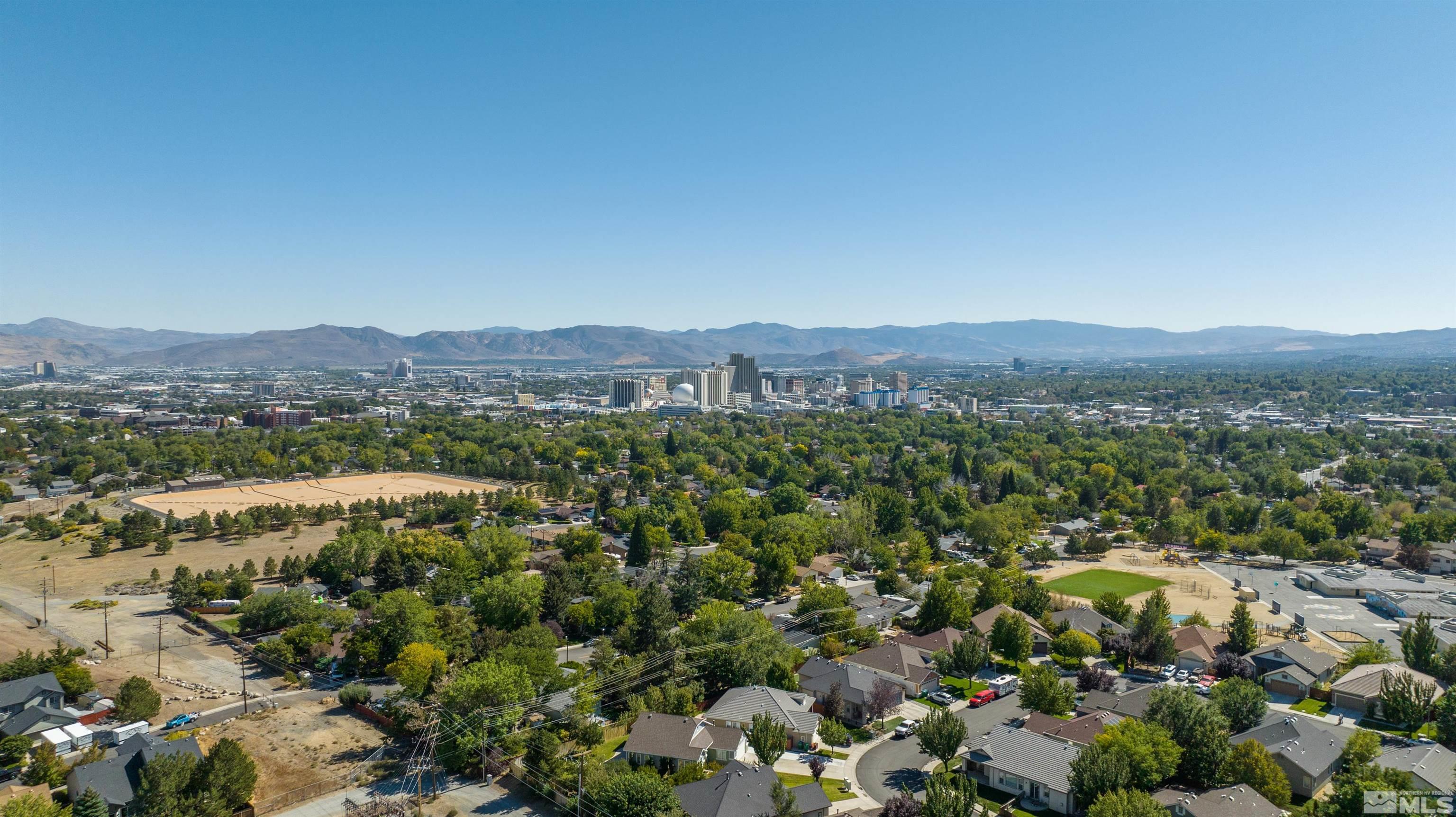 1462 Wessex Circle Reno, NV 89503 - Photo 32 of 40 an aerial view of town with residential houses with outdoor space and trees