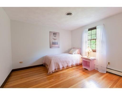 59 Rambling Road Sudbury, MA 01776 - Photo 11 of 24 a bedroom with a bed and a window