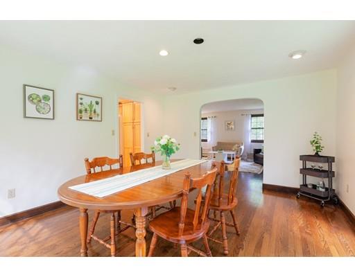 59 Rambling Road Sudbury, MA 01776 - Photo 5 of 24 a view of a dining room with furniture and wooden floor