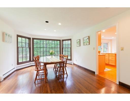 59 Rambling Road Sudbury, MA 01776 - Photo 6 of 24 a view of a dining room with furniture and wooden floor