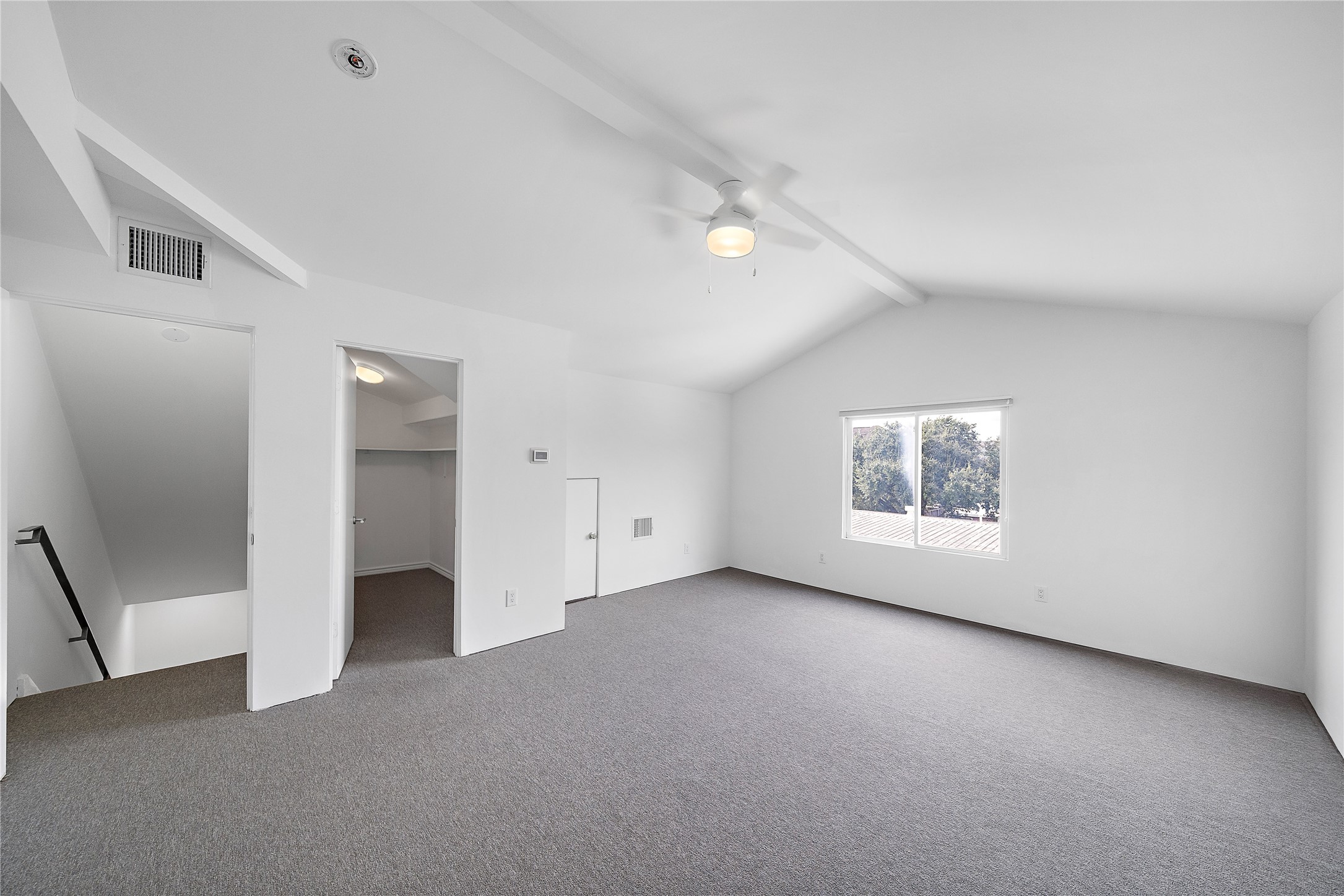 2437 North Boulevard Houston, TX 77098 - Photo 28 of 32 an empty room with a empty space and windows