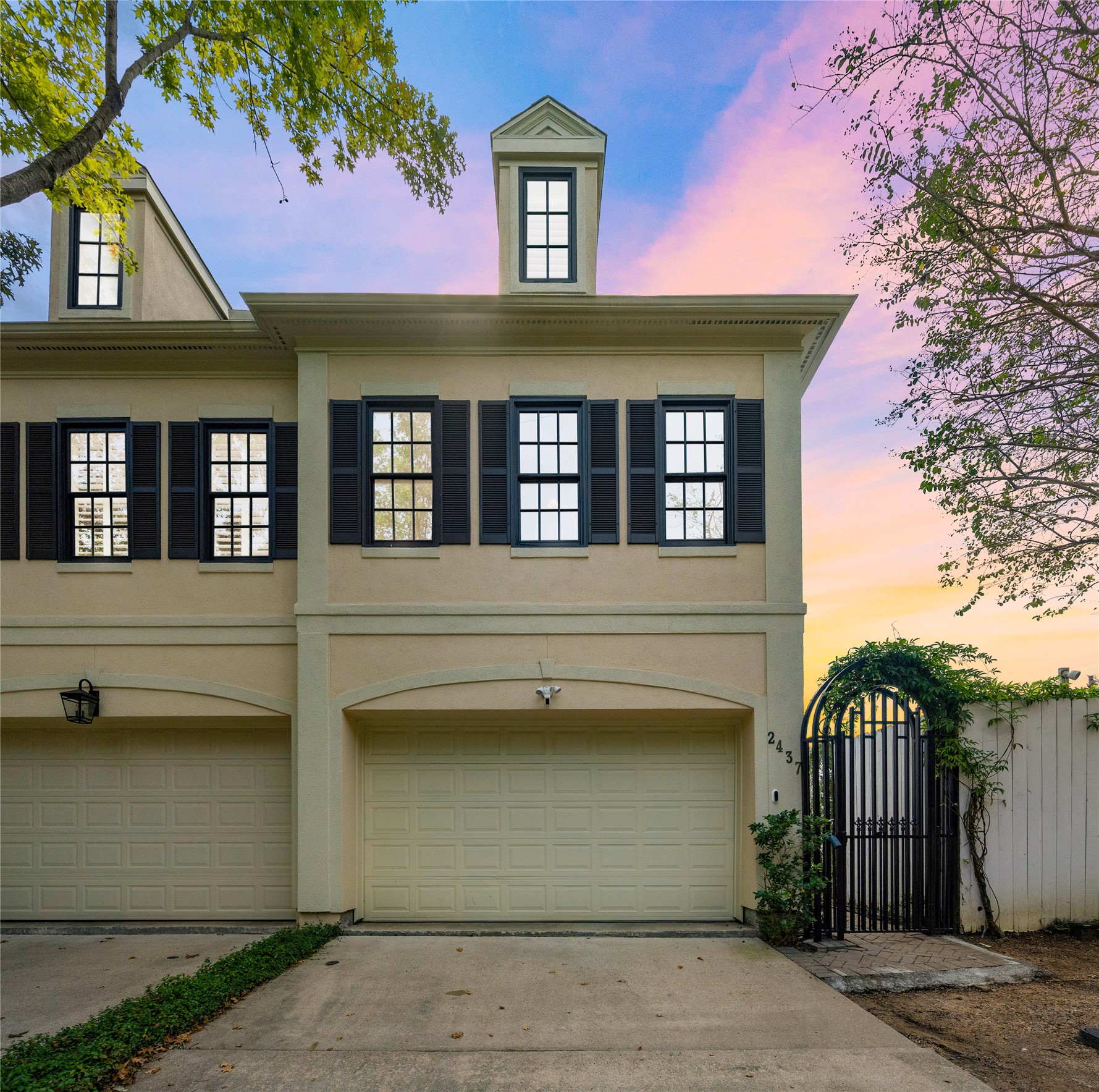 2437 North Boulevard Houston, TX 77098 - Photo 30 of 32 a front view of a house with a garage