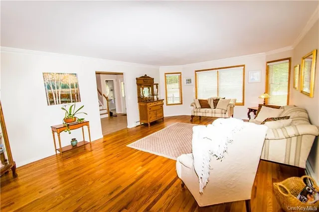 a living room with furniture and a table