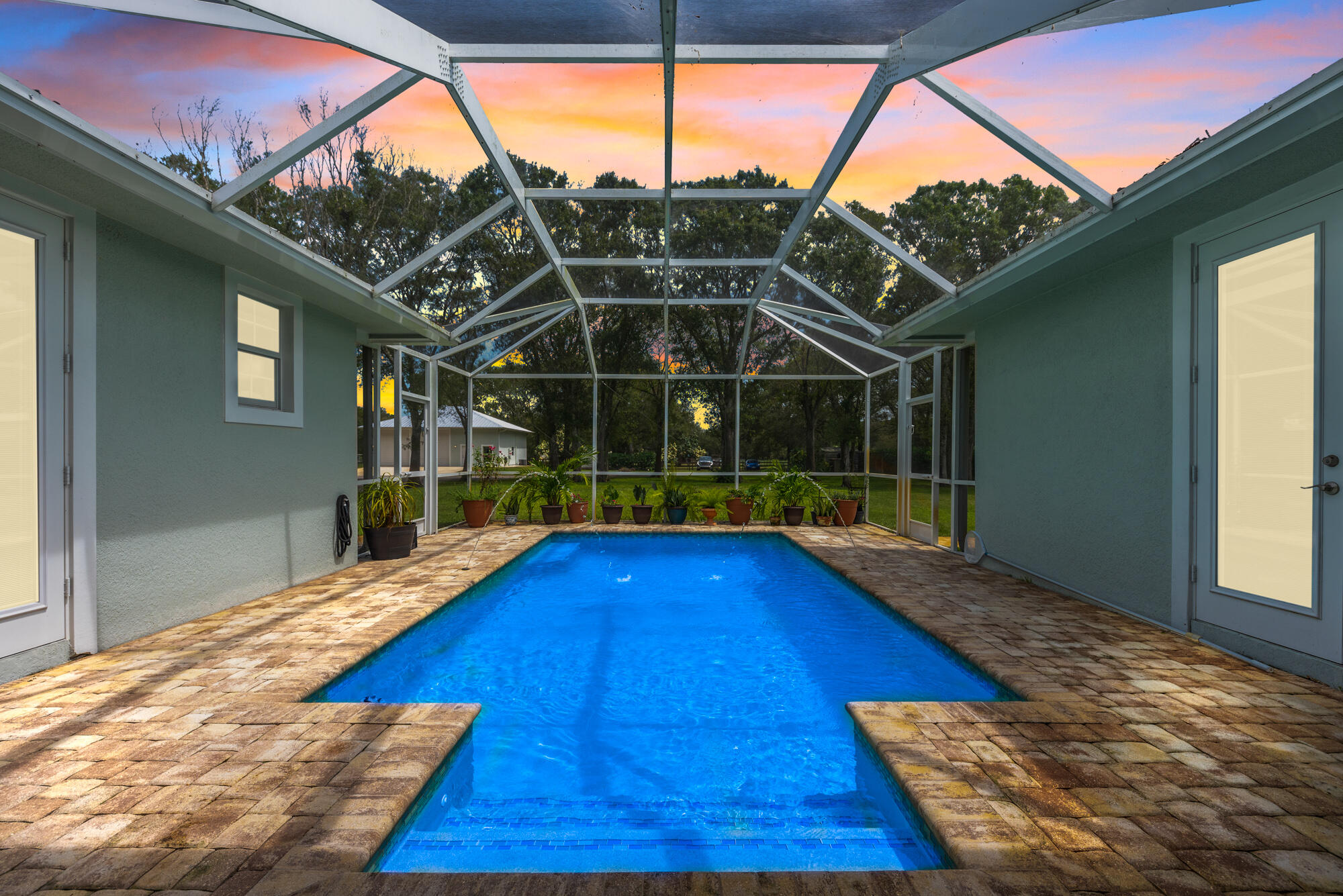 11900 West Midway Road Fort Pierce, FL 34945 - Photo 3 of 48 Nightime Pool