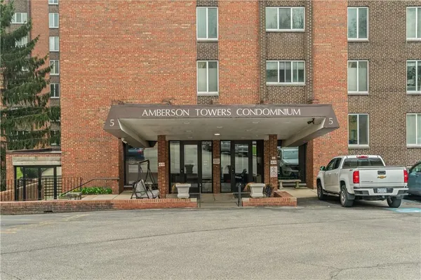 a cars parked in front of a building